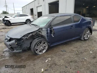 2012 Scion tC with VIN JTKJF5C76C3028115, listed as a Copart auction lot 85315184 with 133,637 mi miles and Salvage Title. Bid and sale history available at carsss.com. Image 1.