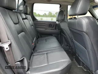 2011 Honda Ridgeline RTL with VIN 5FPYK1F52BB009042, listed as a Copart auction lot 69439004 with 119,889 mi miles and Salvage Title. Bid and sale history available at carsss.com. Image 10.