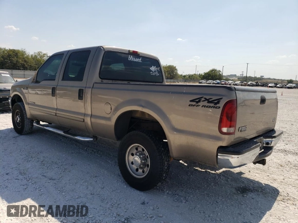 2002 Ford F-350 XL with VIN 3FTSW31F62MA15436, listed as a Copart auction lot 75384314 with 284,637 mi miles and Salvage Title. Bid and sale history available at DreamBid. Image 2.