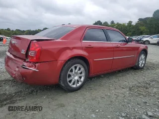 2009 Chrysler 300 Touring with VIN 2C3KA53V99H617274, listed as a Copart auction lot 71791144 with 123,045 mi miles and Salvage Title. Bid and sale history available at carsss.com. Image 3.