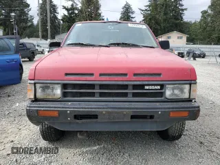 1989 Nissan Hardbody E z VIN 1N6ND16Y9KC352795, wystawiony jako Copart lot #72202814 z przebiegiem 242 396 mil mil oraz Tytuł czysty. Historia ofert i sprzedaży dostępna na DreamBid. Obrazek 5.