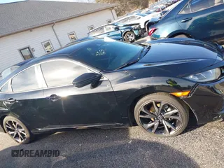 2019 Honda Civic Sport with VIN 2HGFC2F83KH567345, listed as a IAAI auction lot 41353597 with 142,857 mi miles and . Bid and sale history available at DreamBid. Image 13.