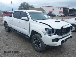 2020 Toyota Tacoma SR5 with VIN 3TMDZ5BN7LM088821, listed as a IAAI auction lot 41657808 with 61,890 mi miles and . Bid and sale history available at DreamBid. Image 1.