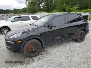 2016 Porsche Cayenne z VIN WP1AA2A22GLA03583, wystawiony jako Copart lot #55271615 z przebiegiem 103 969 mil mil oraz Tytuł czysty. Historia ofert i sprzedaży dostępna na DreamBid. Obrazek 1.
