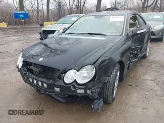 2007 Mercedes-Benz CLK-Class 5.5L with VIN WDBTJ72H77F214706, listed as a IAAI auction lot 41471332 with 87,310 mi miles. Bid and sale history available at carsss.com. Image 2.