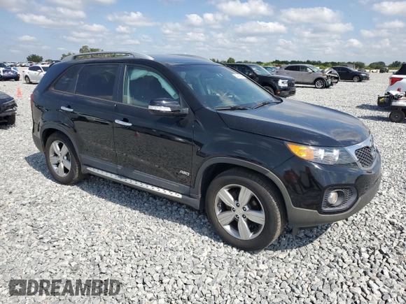 2012 Kia Sorento EX z VIN 5XYKUDA25CG305111, wystawiony jako Copart lot #54216645 z przebiegiem 111 841 mil mil oraz Szkoda całkowita • Salvage title. Historia ofert i sprzedaży dostępna na DreamBid. Obrazek 4.