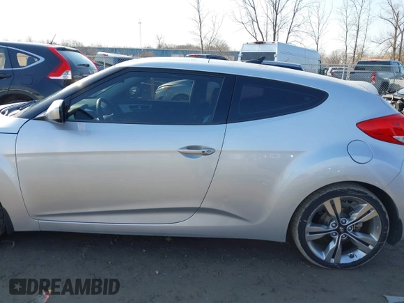 2012 Hyundai Veloster w/Black Int with VIN KMHTC6AD7CU063968, listed as a IAAI auction lot 41764263 with 83,634 mi miles and . Bid and sale history available at DreamBid. Image 14.