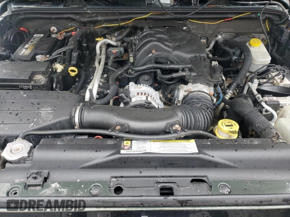 2012 Jeep Wrangler Unlimited Sport with VIN 1C4HJWDG8CL122067, listed as a Copart auction lot 58549805 with 124,658 mi miles and Clean title. Bid and sale history available at DreamBid. Image 12.