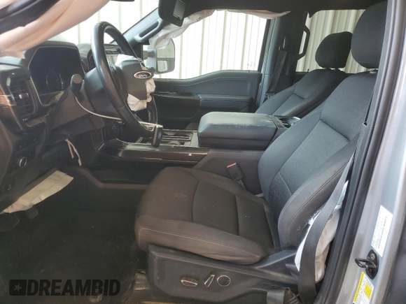 2021 Ford F-150 XL with VIN 1FTFW1E85MKE03933, listed as a Copart auction lot 60513185 with 82,793 mi miles and Salvage title. Bid and sale history available at DreamBid. Image 7.