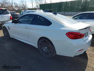 2019 BMW M4 with VIN WBS4Y9C5XKAG67446, listed as a IAAI auction lot 41669865 with 103,230 mi miles. Bid and sale history available at carsss.com. Image 3.