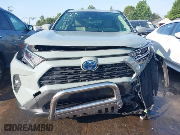 2021 Toyota RAV4 Hybrid LE with VIN JTMB6RFV3MD038562, listed as a IAAI auction lot 42576852 with 27,463 mi miles and . Bid and sale history available at DreamBid. Image 6.