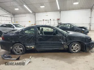 2005 Pontiac Grand Am GT with VIN 1G2NW12E85M140434, listed as a IAAI auction lot 41966294 with 142,548 mi miles. Bid and sale history available at carsss.com. Image 13.