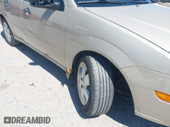 2007 Ford Focus SE with VIN 1FAFP36N47W216229, listed as a IAAI auction lot 42085254 with 57,586 mi miles and . Bid and sale history available at carsss.com. Image 6.