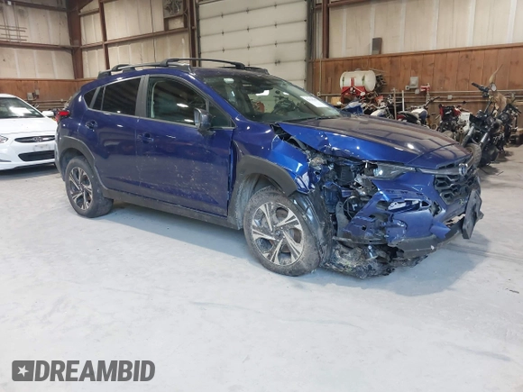 2024 Subaru Crosstrek Premium z VIN JF2GUADC3R8318644, wystawiony jako IAAI lot #42558586 z przebiegiem 33 648 mil mil oraz . Historia ofert i sprzedaży dostępna na DreamBid. Obrazek 1.
