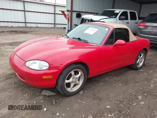 1999 Mazda MX-5 Miata with VIN JM1NB3531X0120856, listed as a IAAI auction lot 41531407 with 92,512 mi miles and . Bid and sale history available at DreamBid. Image 17.