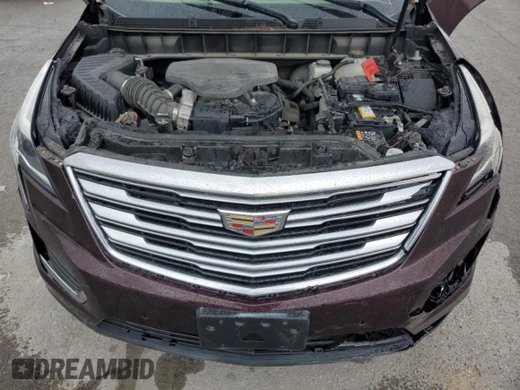 2018 Cadillac XT5 Premium Luxury FWD z VIN 1GYKNERS5JZ127703, wystawiony jako Copart lot #58315215 z przebiegiem Nie podano mil oraz Szkoda całkowita • Salvage title. Historia ofert i sprzedaży dostępna na DreamBid. Obrazek 11.