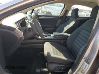 2018 Ford Fusion SE z VIN 3FA6P0LU7JR139974, wystawiony jako Copart lot #69819394 z przebiegiem 164 123 mil mil oraz Szkoda całkowita • Salvage title. Historia ofert i sprzedaży dostępna na DreamBid. Obrazek 7.
