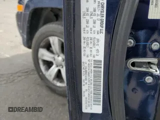 2013 Jeep Patriot Sport with VIN 1C4NJRBBXDD101003, listed as a Copart auction lot 50537555 with 130,940 mi miles and Salvage Title. Bid and sale history available at DreamBid. Image 13.