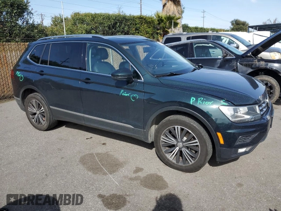 2018 Volkswagen Tiguan SEL with VIN 3VV3B7AX8JM051483, listed as a Copart auction lot 50076645 with 156,356 mi miles and Salvage Title. Bid and sale history available at DreamBid. Image 4.