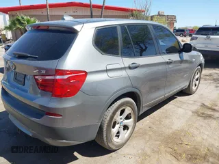 2011 BMW X3 28i with VIN 5UXWX5C55BL710408, listed as a IAAI auction lot 42087592 with 168,569 mi miles and . Bid and sale history available at DreamBid. Image 4.