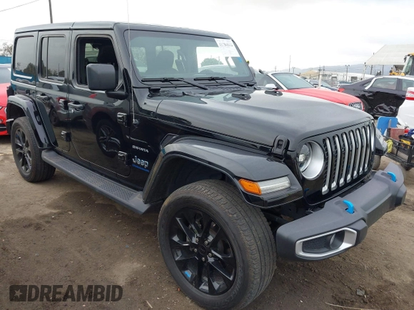 2023 Jeep Wrangler Sahara z VIN 1C4JJXP6XPW556327, wystawiony jako IAAI lot #41784532 z przebiegiem 39 918 mil mil oraz . Historia ofert i sprzedaży dostępna na DreamBid. Obrazek 1.