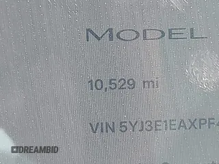 2023 Tesla Model 3 z VIN 5YJ3E1EAXPF414646, wystawiony jako IAAI lot #39514743 z przebiegiem 10 529 mil mil oraz . Historia ofert i sprzedaży dostępna na DreamBid. Obrazek 15.