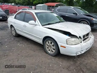 2005 Kia Optima LX z VIN KNAGD128655417156, wystawiony jako IAAI lot #42371618 z przebiegiem 190 000 mil mil oraz . Historia ofert i sprzedaży dostępna na DreamBid. Obrazek 1.
