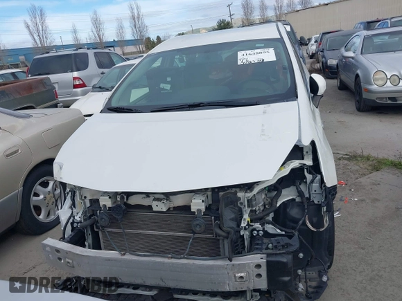 2017 Toyota Prius v Two with VIN JTDZN3EU4HJ066269, listed as a IAAI auction lot 41648895 with 130,727 mi miles. Bid and sale history available at carsss.com. Image 13.