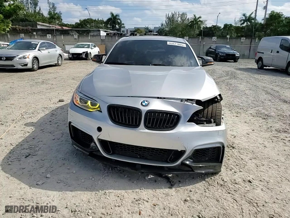 2014 BMW 2 Series M235i with VIN WBA1J7C56EV253025, listed as a Copart auction lot 43221805 with 113,440 mi miles and Salvage Title. Bid and sale history available at carsss.com. Image 14.