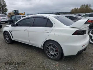 2010 Mitsubishi Lancer Evolution SE with VIN JA32W6FV3AU034052, listed as a Copart auction lot 72463644 with 44,517 mi miles and Salvage Title. Bid and sale history available at carsss.com. Image 2.