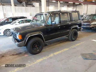 1991 Isuzu Trooper z VIN JACCH58R8M7902476, wystawiony jako IAAI lot #41893980 z przebiegiem 169 269 mil mil oraz . Historia ofert i sprzedaży dostępna na DreamBid. Obrazek 2.