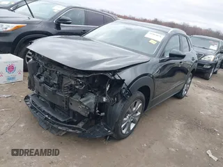 2023 Mazda CX-30 S Carbon Edition with VIN 3MVDMBCMXPM553129, listed as a IAAI auction lot 41864876 with 18,317 mi miles and . Bid and sale history available at DreamBid. Image 18.
