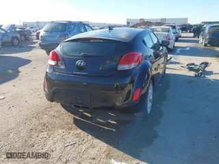 2012 Hyundai Veloster w/Gray Int with VIN KMHTC6AD6CU046899, listed as a IAAI auction lot 41804550 with 105,686 mi miles. Bid and sale history available at carsss.com. Image 4.