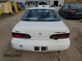 1996 Geo Prizm z VIN 1Y1SK5261TZ028032, wystawiony jako Copart lot #77434654 z przebiegiem 54 665 mil mil oraz Tytuł czysty. Historia ofert i sprzedaży dostępna na DreamBid. Obrazek 6.