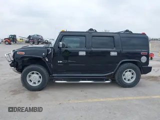 2005 Hummer H2 SUV z VIN 5GRGN23UX5H106375, wystawiony jako IAAI lot #41997745 z przebiegiem 152 827 mil mil oraz . Historia ofert i sprzedaży dostępna na DreamBid. Obrazek 14.
