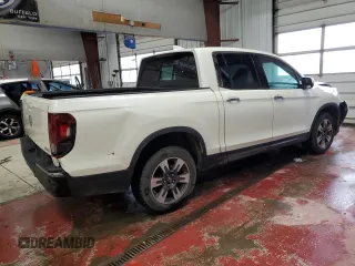 2017 Honda Ridgeline RTL-E with VIN 5FPYK3F72HB002890, listed as a Copart auction lot 57699735 with 128,813 mi miles and Salvage title. Bid and sale history available at DreamBid. Image 3.