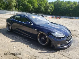 2013 Tesla Model S Performance с VIN 5YJSA1DP1DFP04055, выставлен на аукционе Copart как лот 57418615 с пробегом Не указан миль и Списание • Salvage title. История ставок и продаж доступна на DreamBid. Изображение 4.