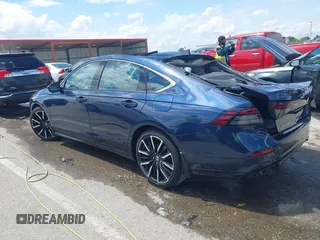 2023 Honda Accord Touring with VIN 1HGCY2F81PA048434, listed as a IAAI auction lot 42306343 with 14,878 mi miles and . Bid and sale history available at DreamBid. Image 14.