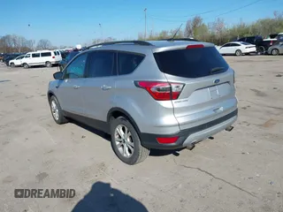 2017 Ford Escape SE with VIN 1FMCU0GDXHUB27848, listed as a IAAI auction lot 42047589 with 128,823 mi miles. Bid and sale history available at carsss.com. Image 3.