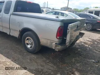 2001 Ford F-150 with VIN 2FTZX17221CB01390, listed as a IAAI auction lot 42194407 with 239,834 mi miles and . Bid and sale history available at DreamBid. Image 6.