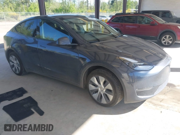 2023 Tesla Model Y Long Range with VIN 7SAYGAEE4PF906577, listed as a IAAI auction lot 42174987 with 13,260 mi miles and . Bid and sale history available at DreamBid. Image 1.