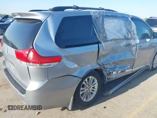 2014 Toyota Sienna XLE with VIN 5TDYK3DC8ES423450, listed as a IAAI auction lot 41972128 with 145,374 mi miles. Bid and sale history available at carsss.com. Image 4.