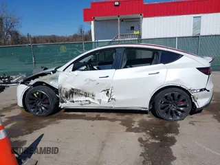 2021 Tesla Model Y Performance with VIN 5YJYGDEF8MF246658, listed as a IAAI auction lot 41679793 with 28,015 mi miles and . Bid and sale history available at DreamBid. Image 14.