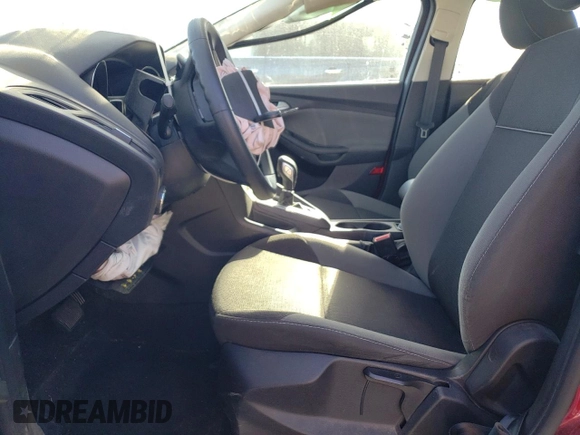 2014 Ford Focus SE with VIN 1FADP3F20EL340123, listed as a Copart auction lot 77626984 with 69,487 mi miles and Salvage Title. Bid and sale history available at DreamBid. Image 7.