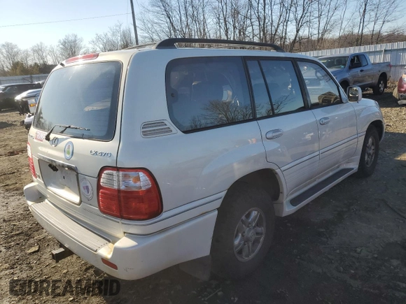 2002 Lexus LX 470 z VIN JTJHT00W123521886, wystawiony jako Copart lot #49223485 z przebiegiem 190 398 mil mil oraz Czysty tytuł • Clean title. Historia ofert i sprzedaży dostępna na DreamBid. Obrazek 3.