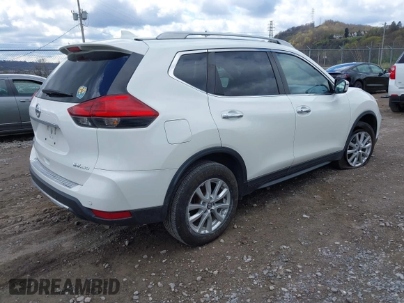 2019 Nissan Rogue SL with VIN 5N1AT2MV1KC809839, listed as a IAAI auction lot 42048435 with 96,300 mi miles and . Bid and sale history available at carsss.com. Image 4.