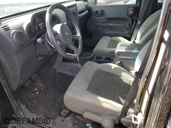 2008 Jeep Wrangler Unlimited X with VIN 1J4GB39118L505846, listed as a Copart auction lot 64015204 with 196,061 mi miles and Salvage Title. Bid and sale history available at DreamBid. Image 7.