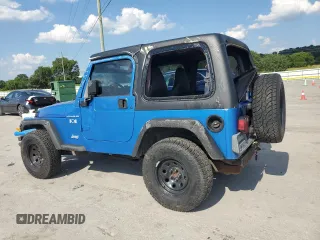 2002 Jeep Wrangler X with VIN 1J4FA39S92P776435, listed as a Copart auction lot 62792235 with 182,385 mi miles and Salvage title. Bid and sale history available at DreamBid. Image 2.