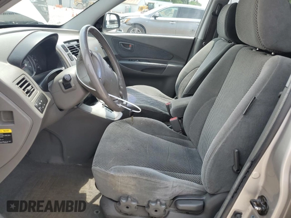 2006 Hyundai Tucson GLS with VIN KM8JN72D46U261840, listed as a Copart auction lot 60743025 with 155,077 mi miles and Salvage title. Bid and sale history available at DreamBid. Image 7.