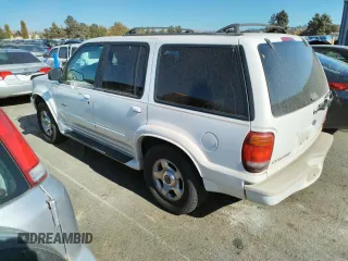 1999 Ford Explorer XLT with VIN 1FMZU34E8XZB27387, listed as a Copart auction lot 74398364 with 211,520 mi miles and Clean title. Bid and sale history available at DreamBid. Image 2.